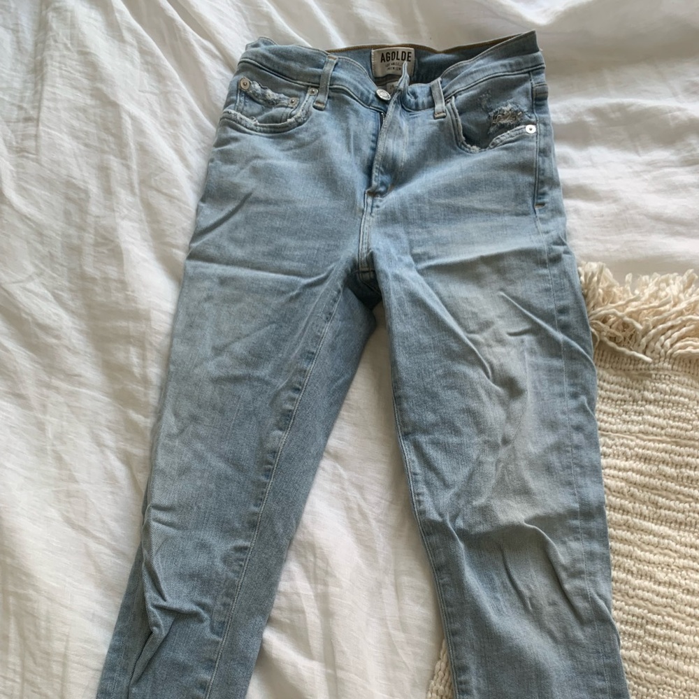 Skinny light wash distressed Agolde jeans, size 24